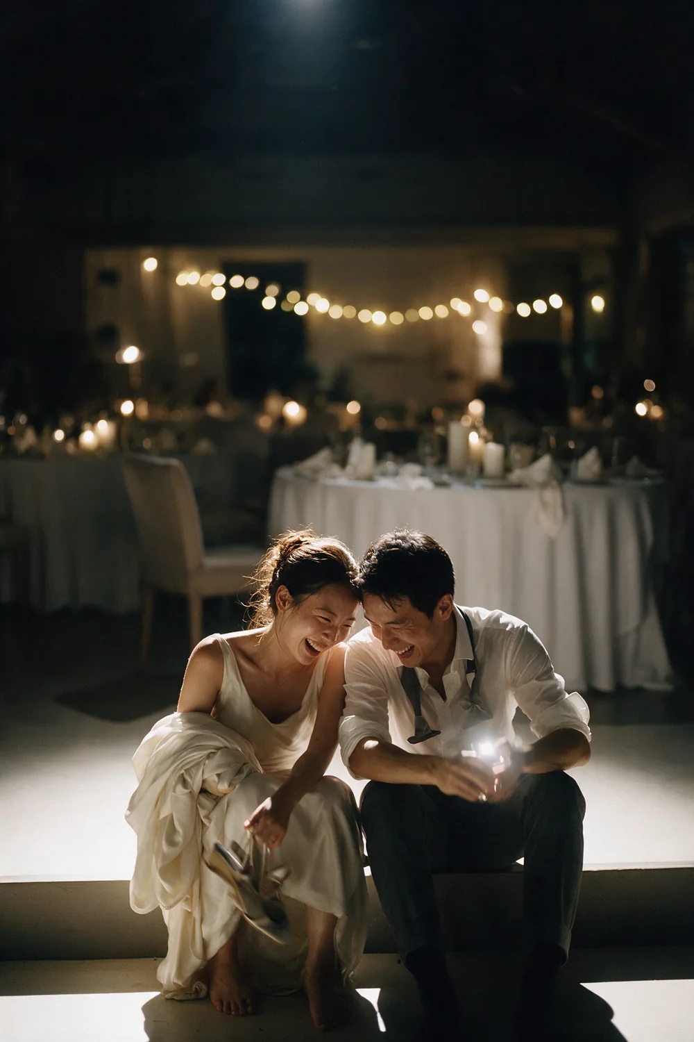 The last hour of the reception, the two of them on the floor.
